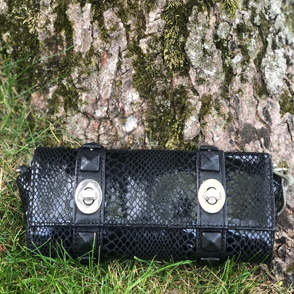 Faux snakeskin clutch with silver hardware detail